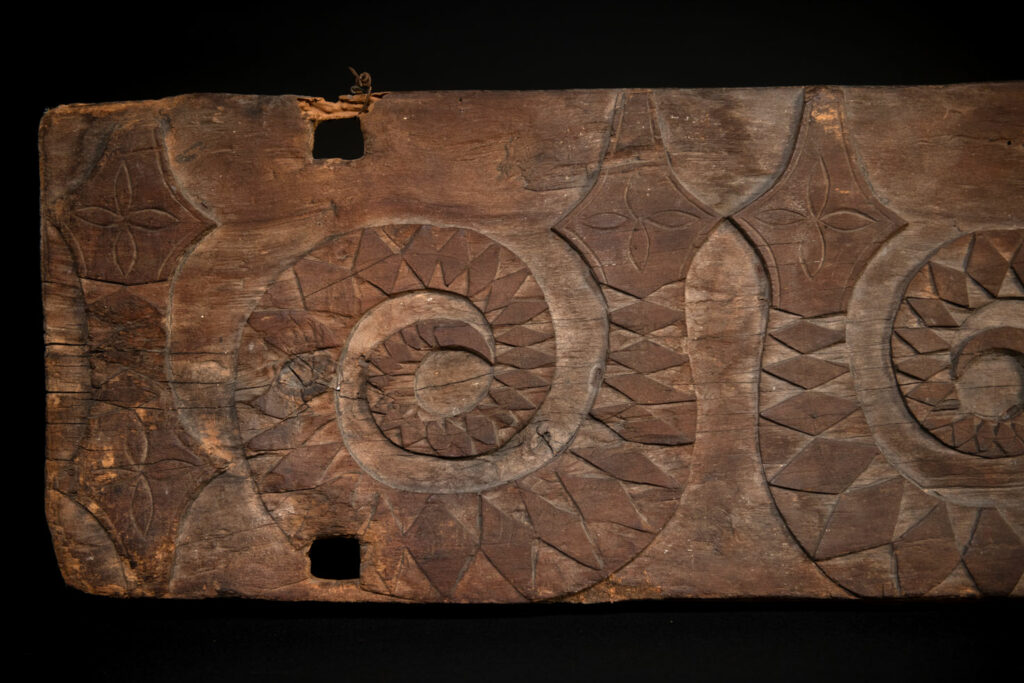 Paiwan tribe house Eave from Majia Township 瑪家鄉 - South Taiwan- Carved with human faces in the Majia style and sacred snakes positioned back to back.