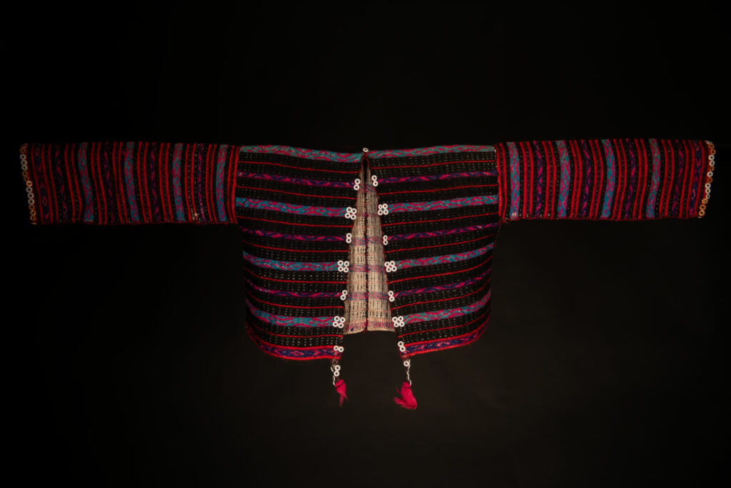 Atayal tribe vest made of Linen and colored wool and old mother of pearl buttons. Can be worn by men or women