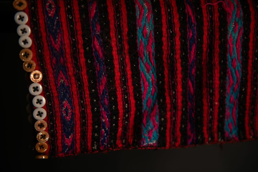 Atayal tribe vest made of Linen and colored wool and old mother of pearl buttons. Can be worn by men or women