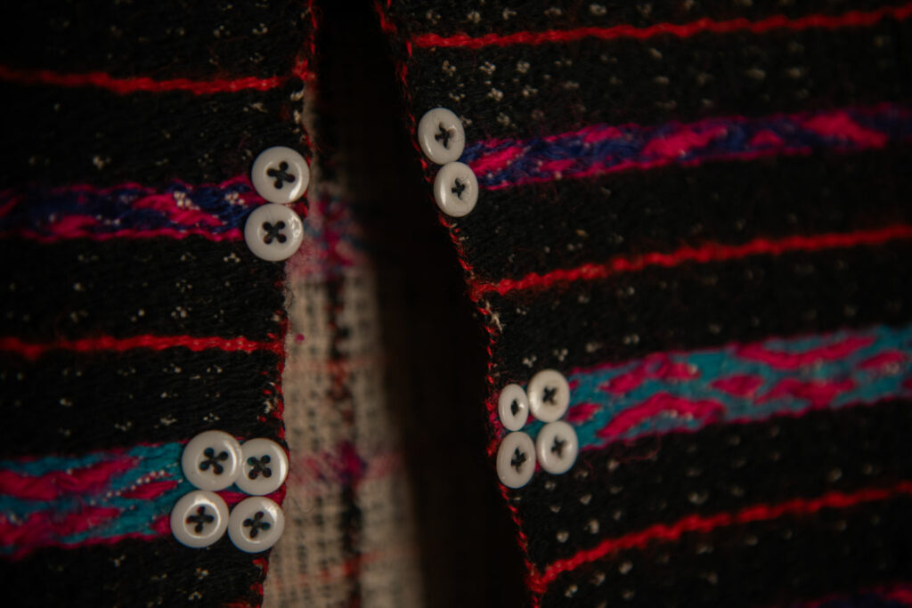 Atayal tribe vest made of Linen and colored wool and old mother of pearl buttons. Can be worn by men or women