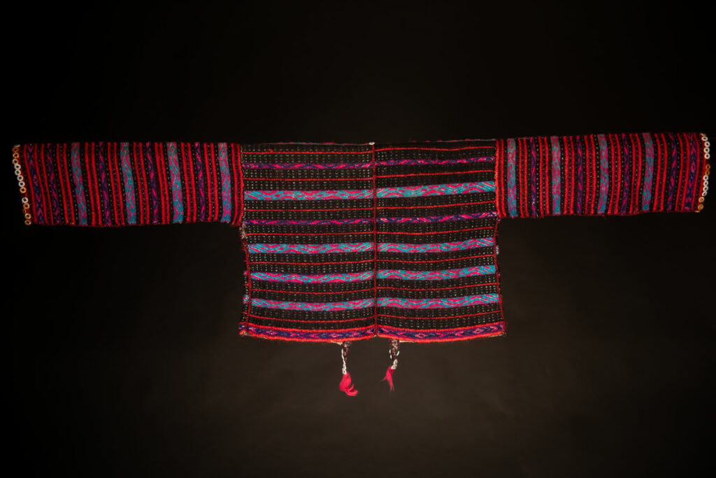 Atayal tribe vest made of Linen and colored wool and old mother of pearl buttons. Can be worn by men or women