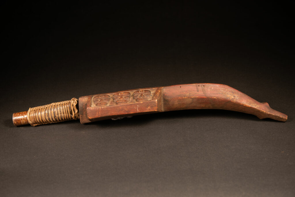 Paiwan tribe Hunter sword carved with snake at the front and 3 human faces at the side