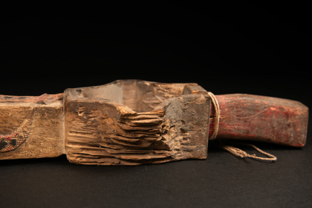 Eroded Paiwan tribe wooden cup for millet wine . Carved with human face and snake and paint.