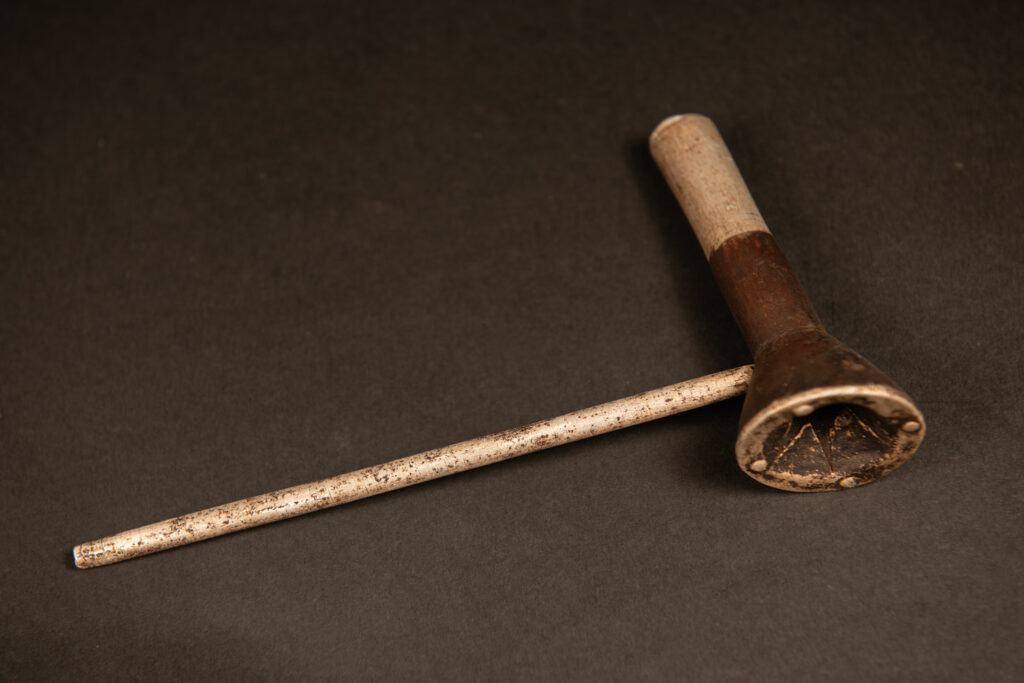Pipe from Attayal tribe made of wood and aluminium . Part of wood are paint in silver.