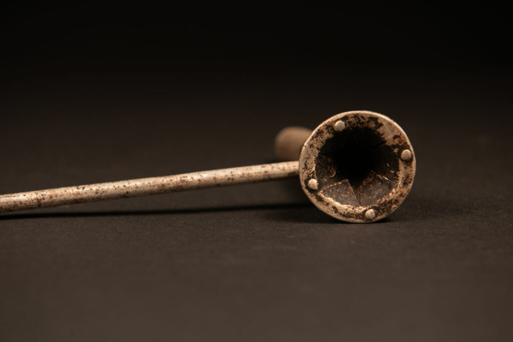 Pipe from Attayal tribe made of wood and aluminium . Part of wood are paint in silver.