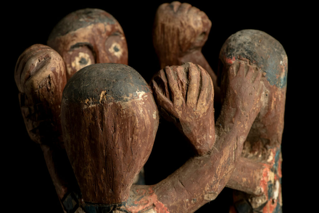 Painted wooden statue depicting figures performing a ritual dance – Paiwan tribe
