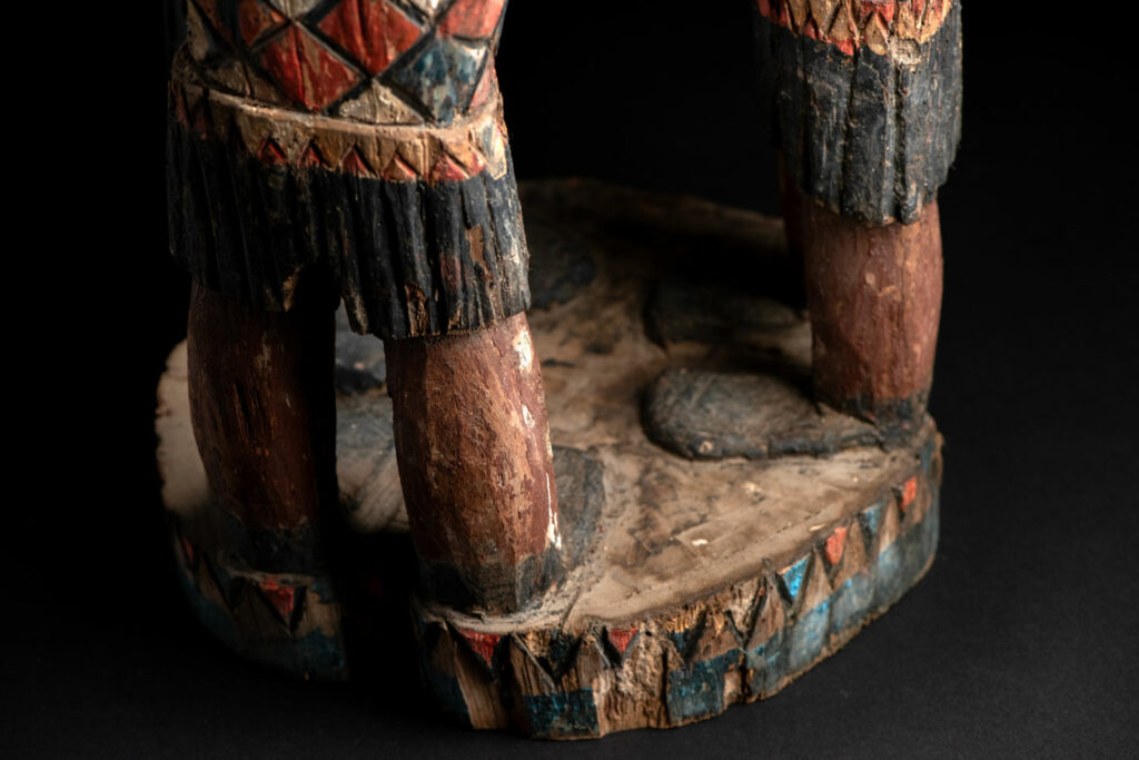 Painted wooden statue depicting figures performing a ritual dance – Paiwan tribe