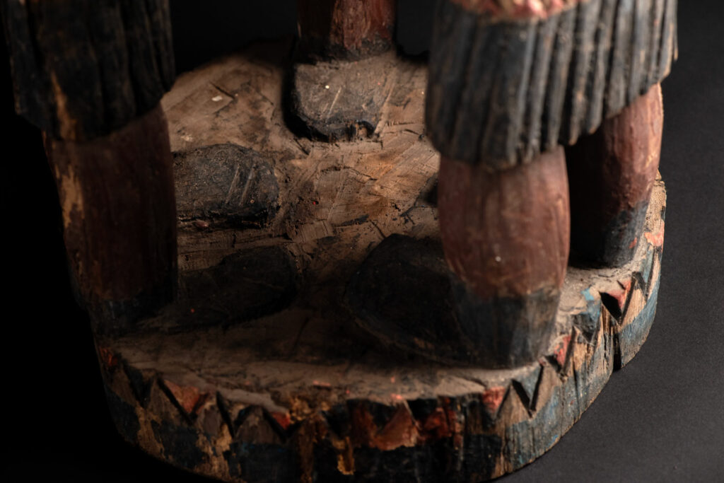 Painted wooden statue depicting figures performing a ritual dance – Paiwan tribe