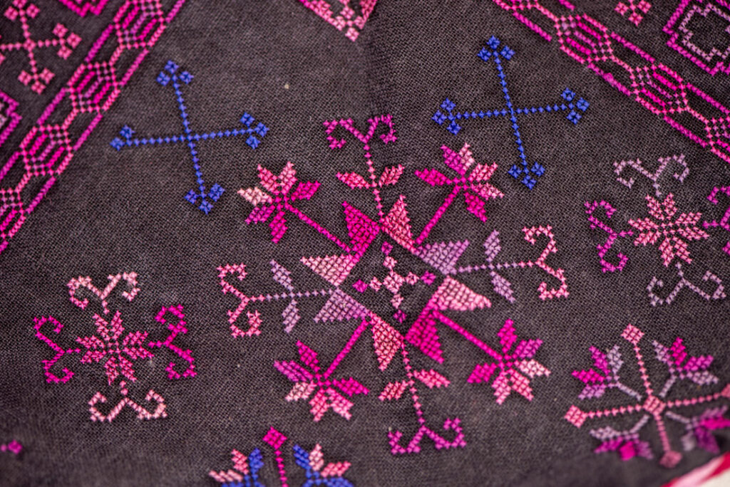 Female chest covering Puyuma tribe . The chest covering is crafted in a diamond shape and features intricate embroidery.