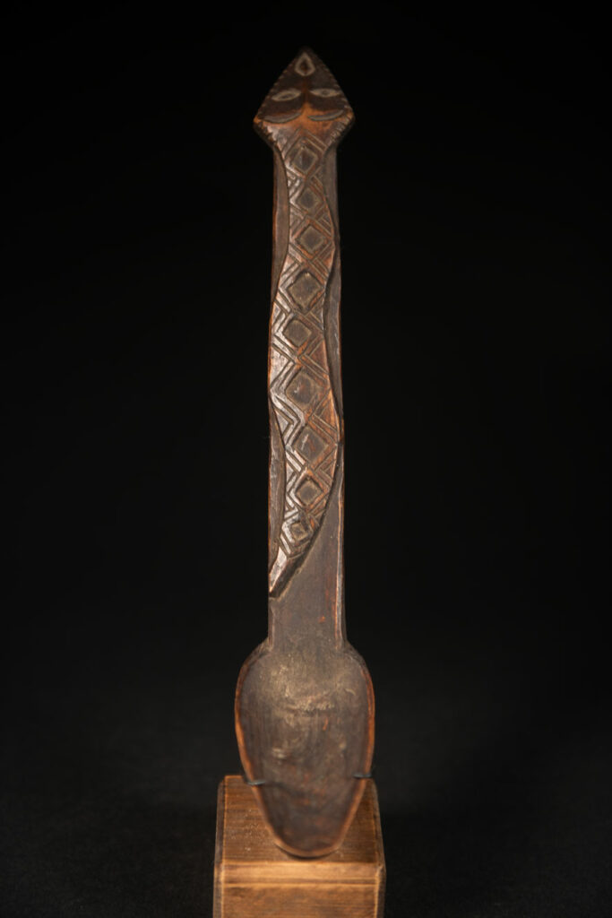 Paiwan tribe spoon in wood, carved at the front with a sacred one hundred pace snake.