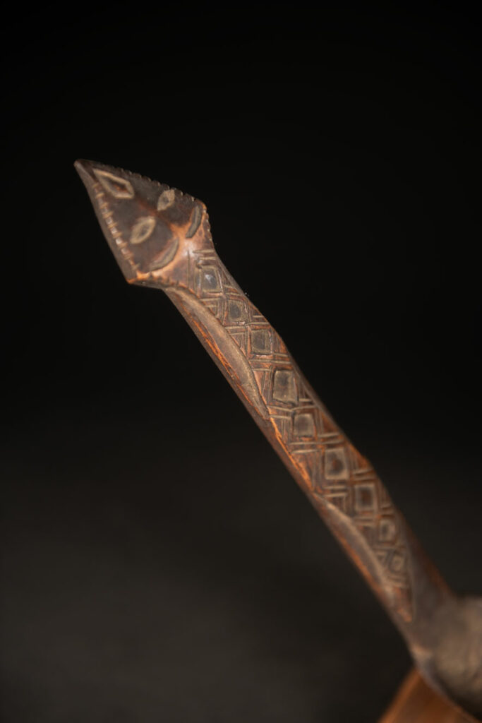 Paiwan tribe spoon in wood, carved at the front with a sacred one hundred pace snake.