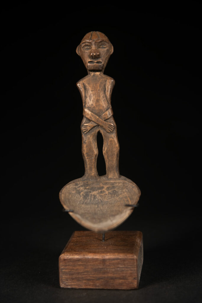 Paiwan tribe spoon carved with a Paiwan man