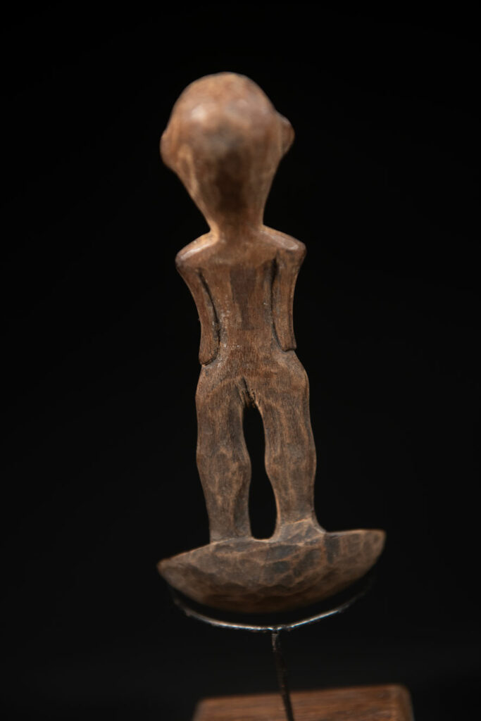 Paiwan tribe spoon carved with a Paiwan man