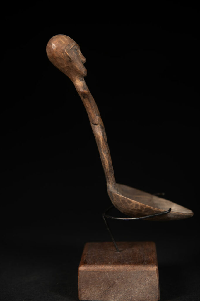 Paiwan tribe spoon carved with a Paiwan man
