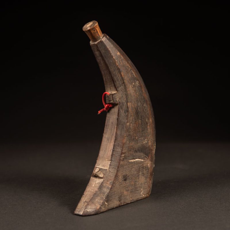 Attayal tribe horn powder flask with a bamboo lid and no carving on it