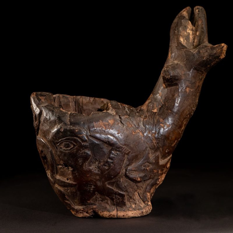 Paiwan tribe archaic ritual cup of a shaman carved with a standing hunter at the front, sacred snakes , deer on the lid and a hunter with his dog hunting a wilde animal
