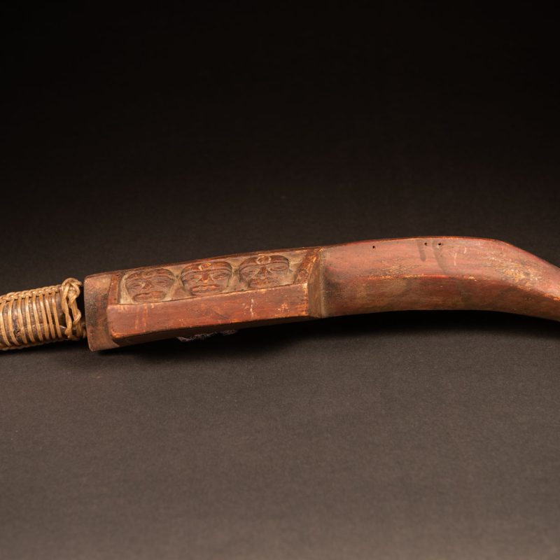 Paiwan tribe Hunter sword carved with snake at the front and 3 human faces at the side