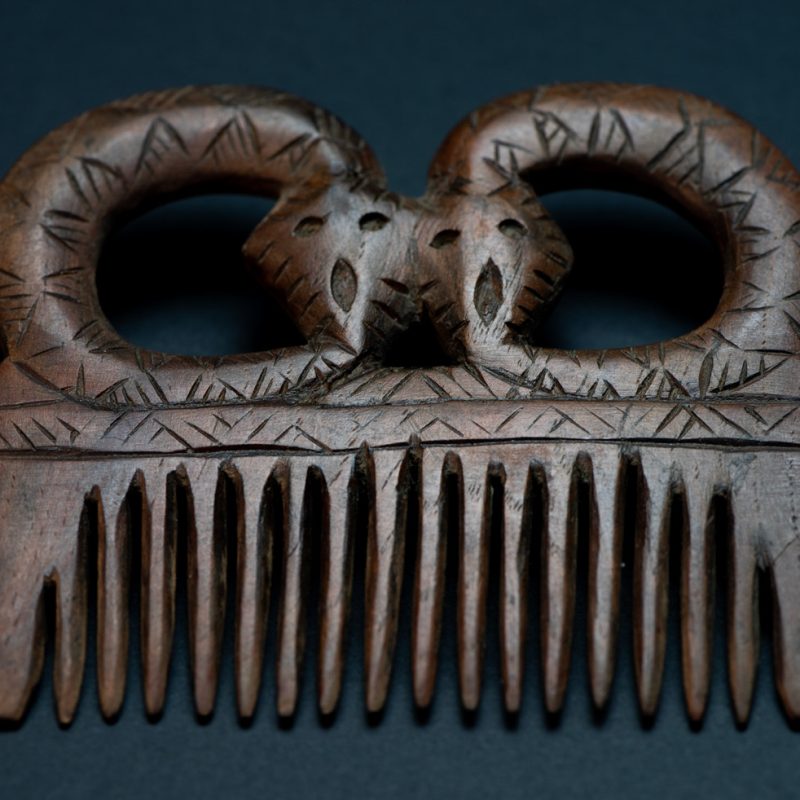 Ancient Paiwan tribe wooden Comb carved with two snake on the top
