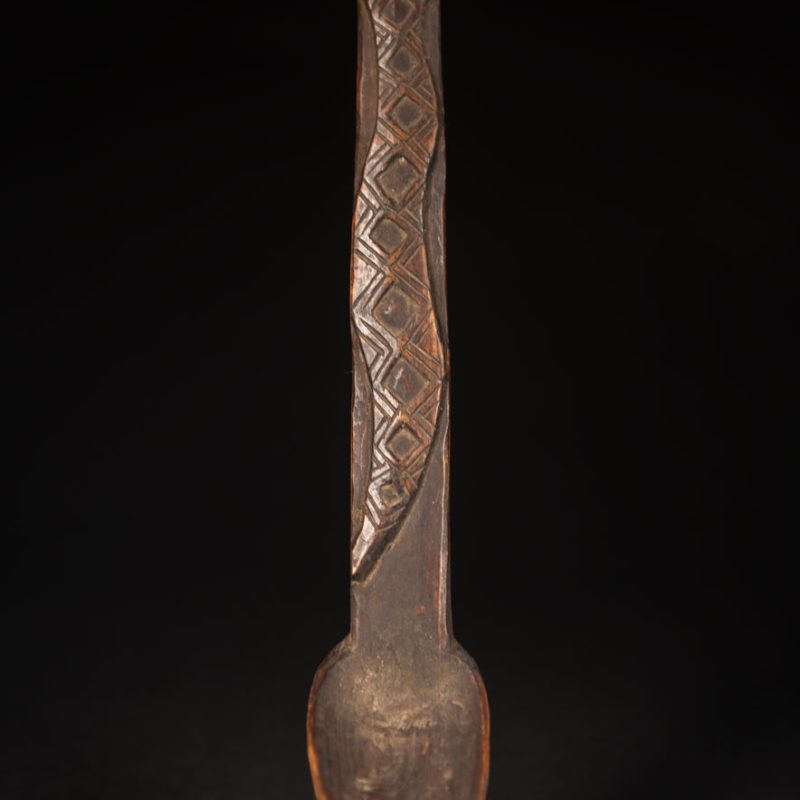 Paiwan tribe spoon in wood, carved at the front with a sacred one hundred pace snake.