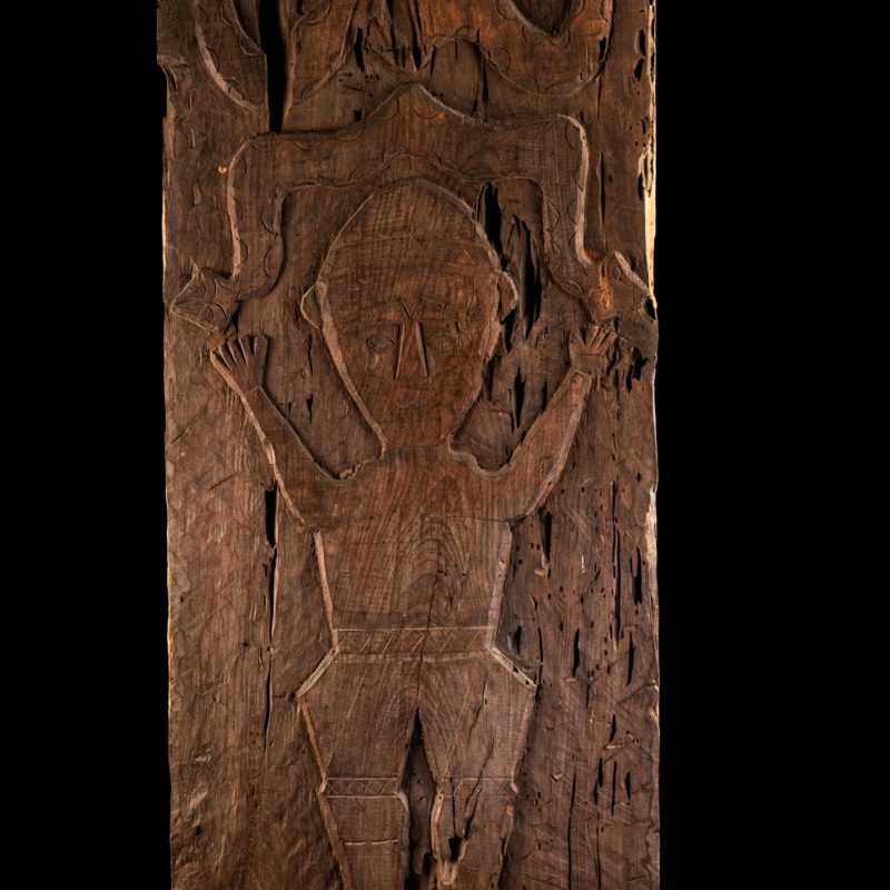 ancient Paiwan tribe panel carved with a standing man, part of a house partition or used as small doors or shutters – South Taiwan